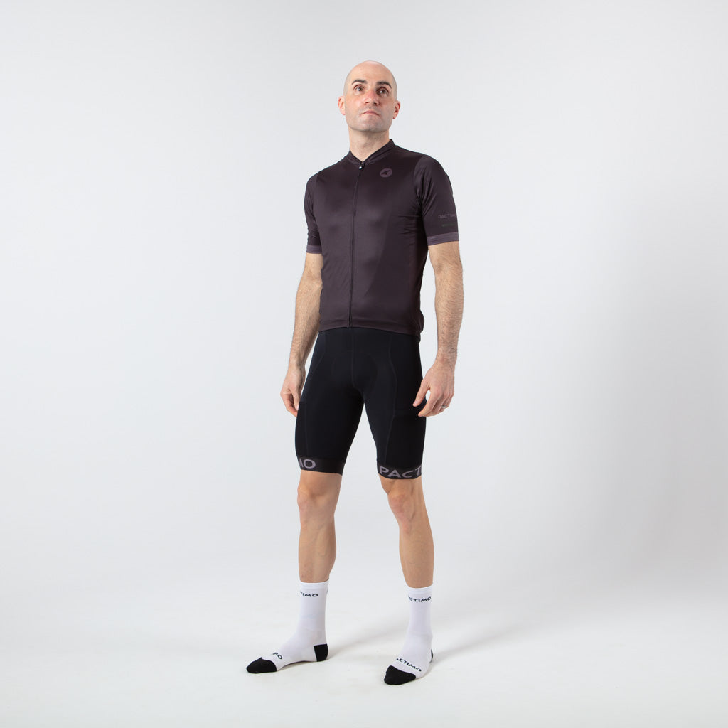Loose Fit Cycling Jersey for Men - On Body Front View #color_black